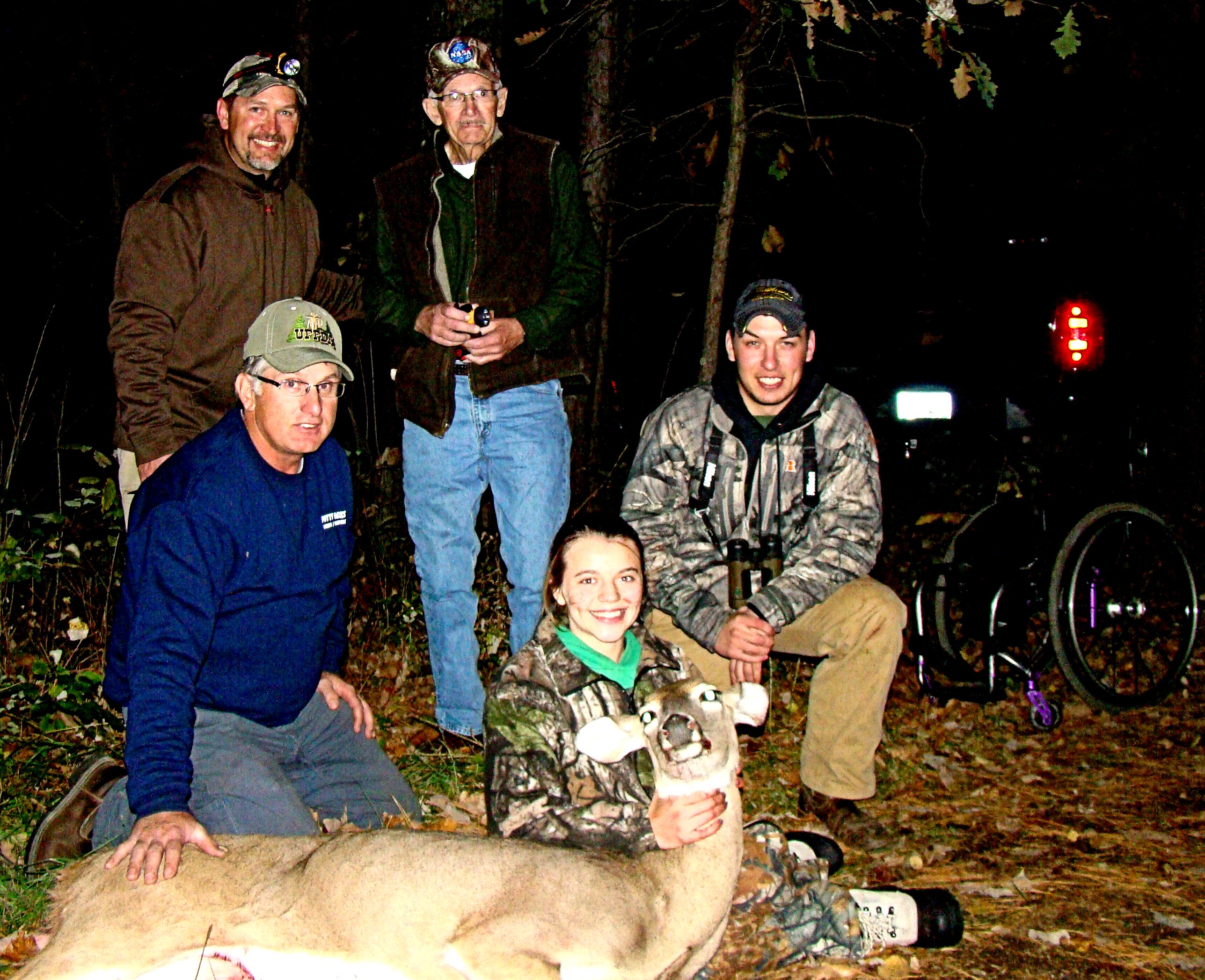 Brynn Duncan surrounded by (l to r) Richard Swenson on ground, Kelly, Dean and Kody Craft (3-generations of excellence).